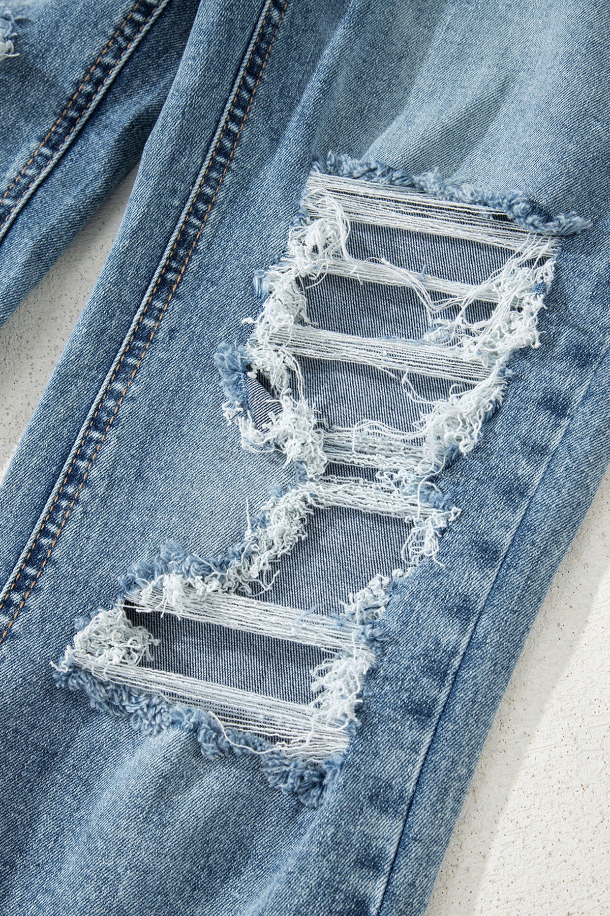 Raw Edge Flare Jeans