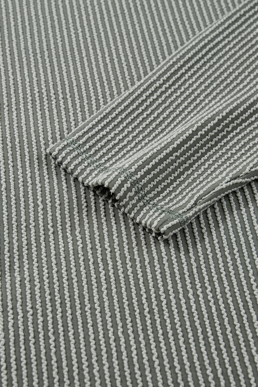 Parchment Twisted Rib Exposed Seam Detail Long Sleeve Loose Top